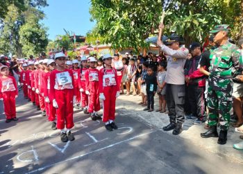 Wujudkan Keamanan Anggota Polsek Kubu Pengamaan Lomba  Gerak Jalan Tingkat SD