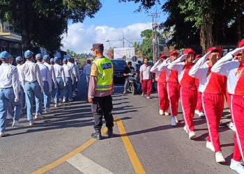 Polsek Rendang Melaksanakan Pengamanan Kegiatan Lomba Gerak Jalan Tingkat SMP Dan SMA Kecamatan Rendang